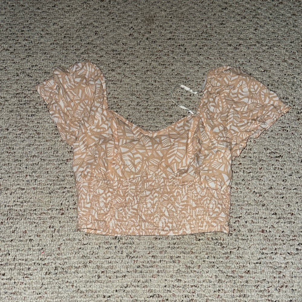 Tan and white cropped shirt with ruffle sleeves size large